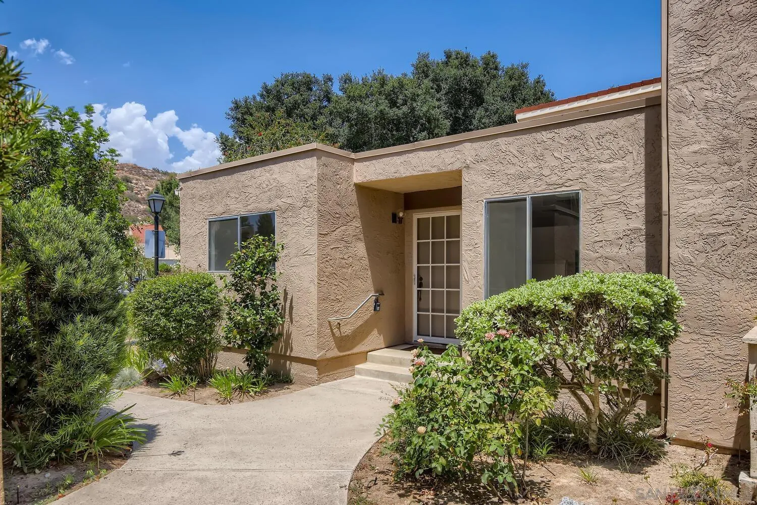 23949 Green Haven Lane Ramona, CA 92065 - Photo 2 of 28 a front view of a house with garden