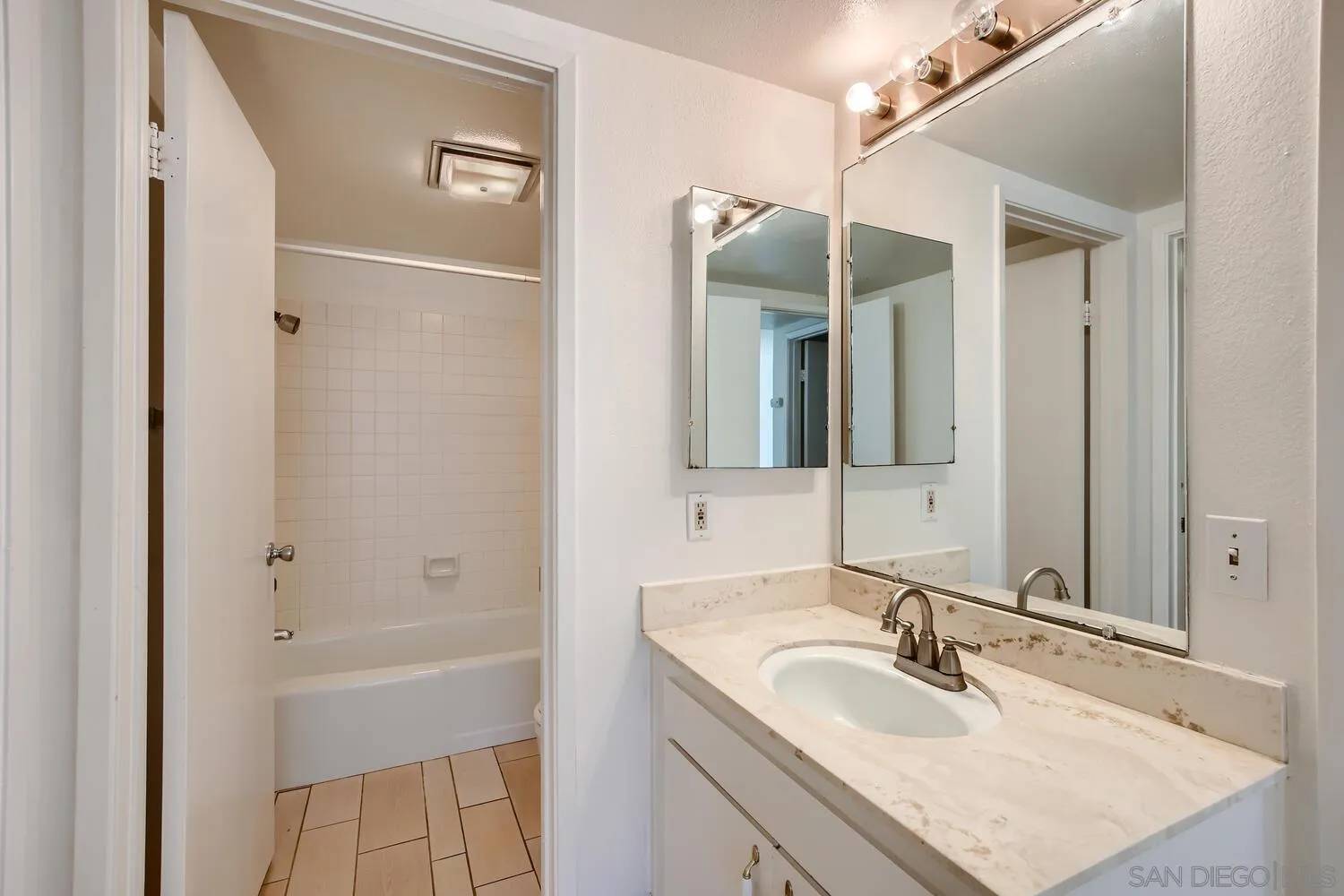 23949 Green Haven Lane Ramona, CA 92065 - Photo 21 of 28 a bathroom with a sink and a mirror