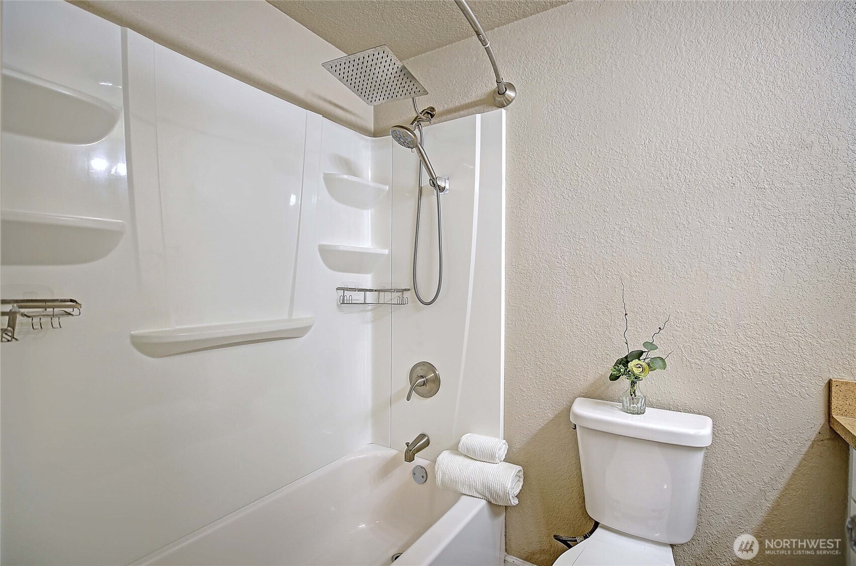 208 West Galena Street Granite Falls, WA 98252 - Photo 16 of 40 a bathroom with a shower a toilet and a shower