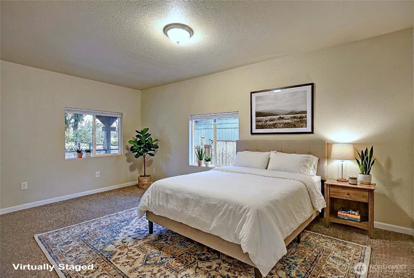 208 West Galena Street Granite Falls, WA 98252 - Photo 21 of 40 a bedroom with a bed and a lamp with window