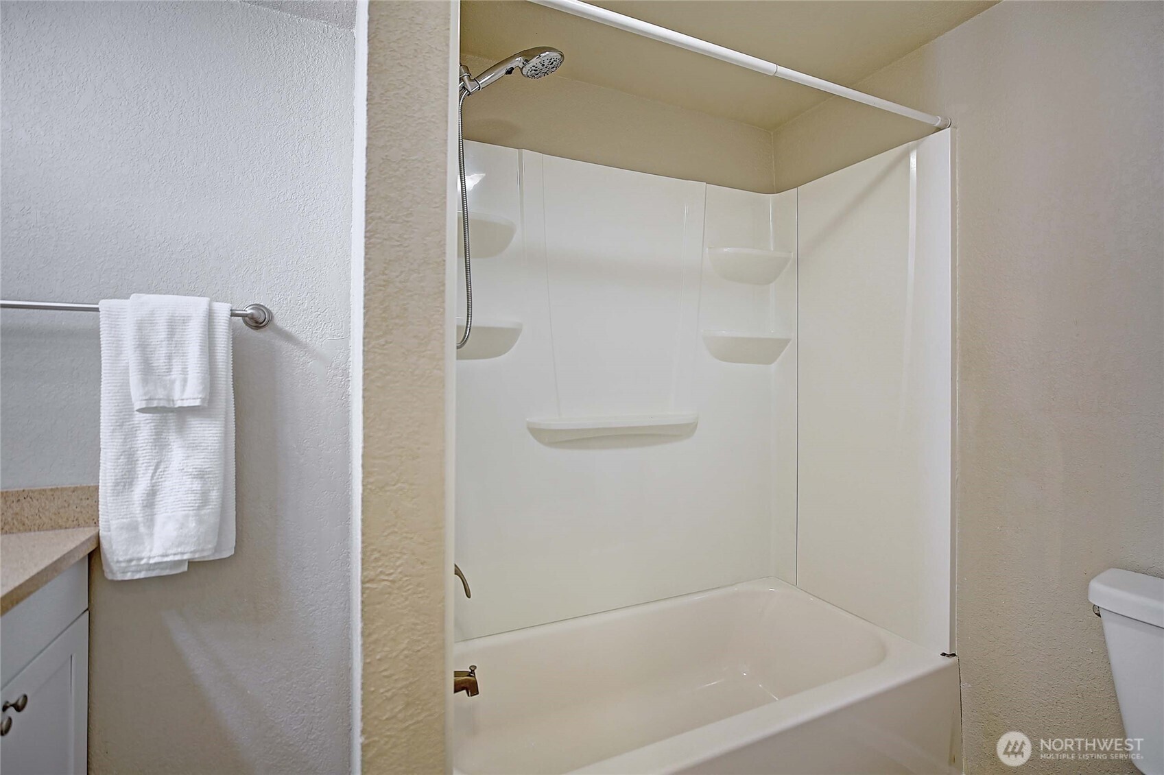 208 West Galena Street Granite Falls, WA 98252 - Photo 22 of 40 a bathroom with a bathtub and a shower