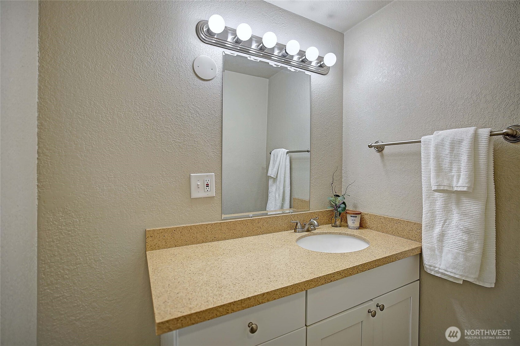 208 West Galena Street Granite Falls, WA 98252 - Photo 23 of 40 a bathroom with a sink and a mirror