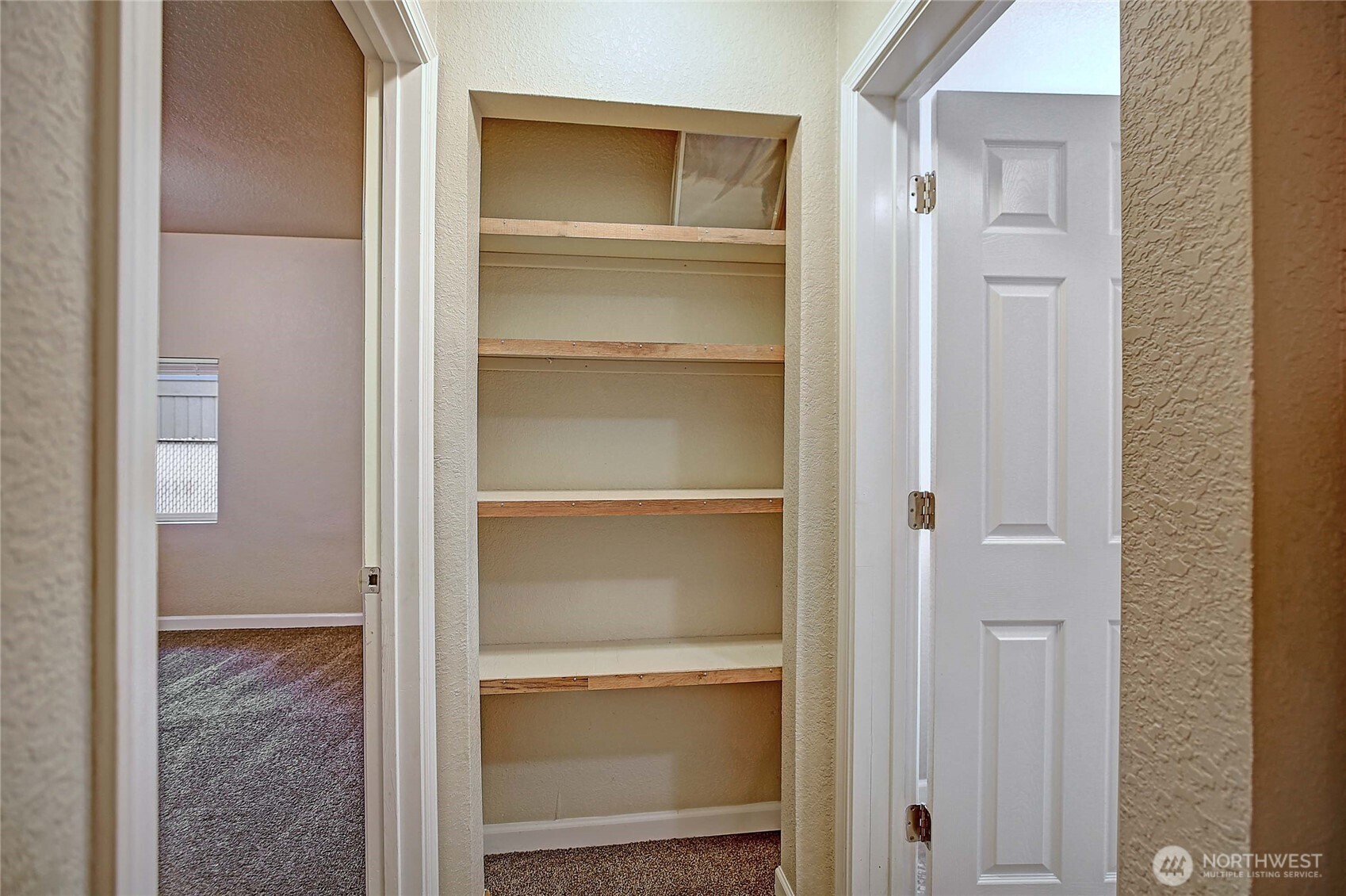 208 West Galena Street Granite Falls, WA 98252 - Photo 25 of 40 a view of walk in closet with empty room