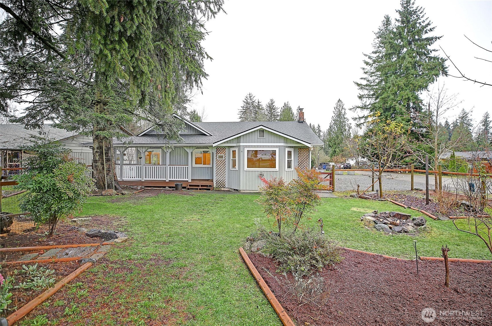 208 West Galena Street Granite Falls, WA 98252 - Photo 28 of 40 a view of a house with backyard and garden