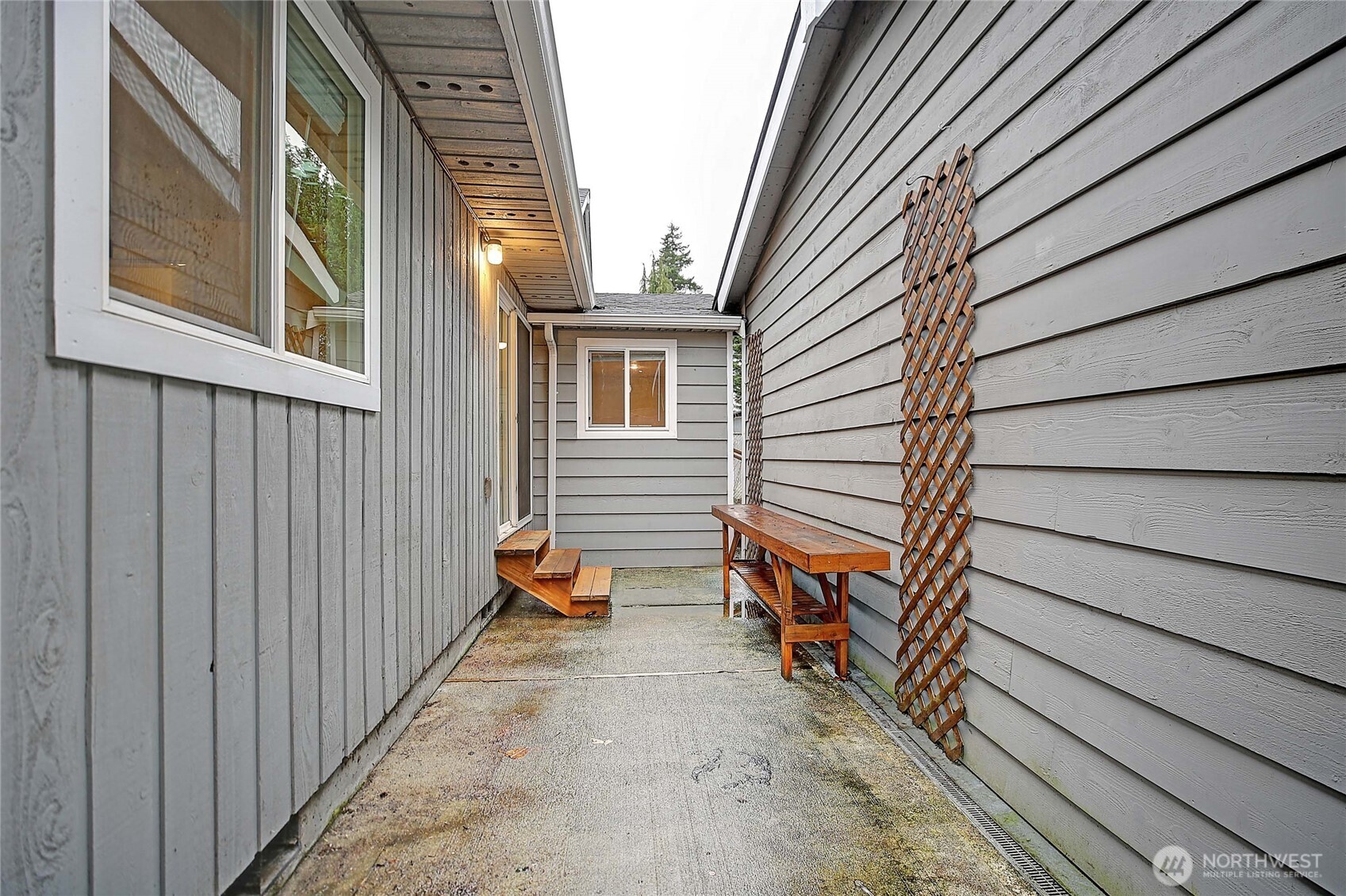 208 West Galena Street Granite Falls, WA 98252 - Photo 32 of 40 a view of a house with backyard and sitting area