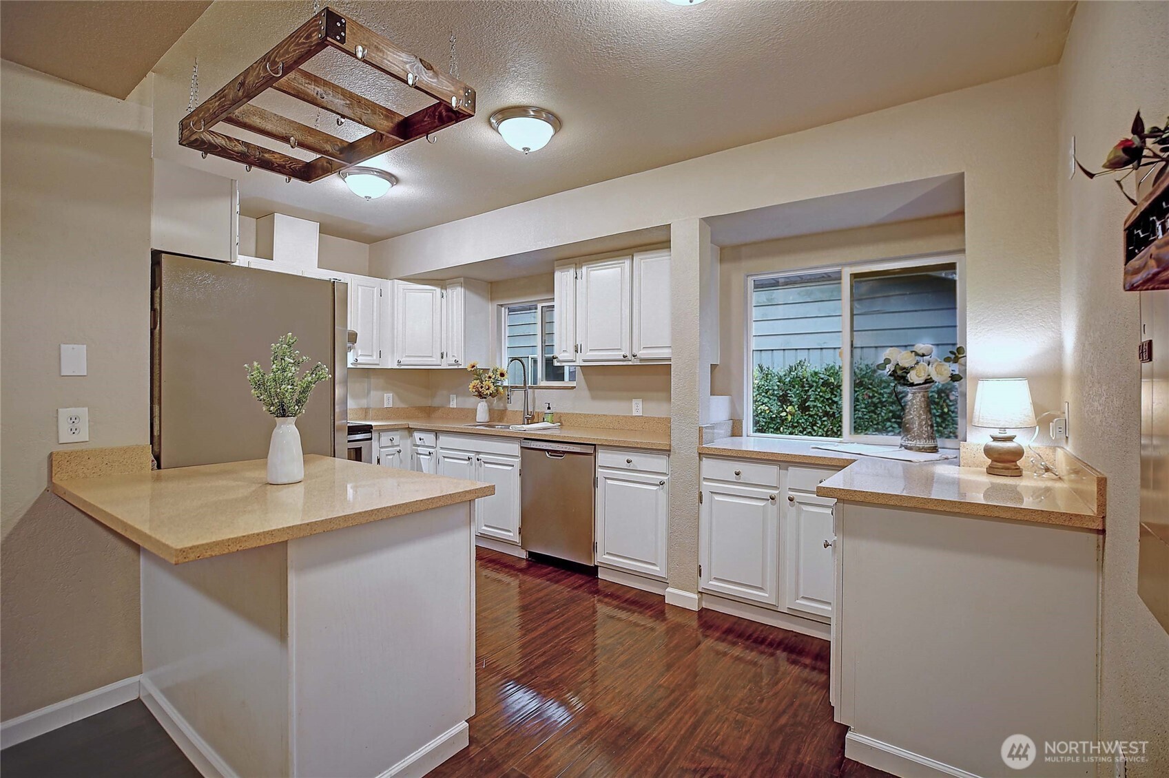 208 West Galena Street Granite Falls, WA 98252 - Photo 8 of 40 a kitchen with a sink a counter top space and appliances