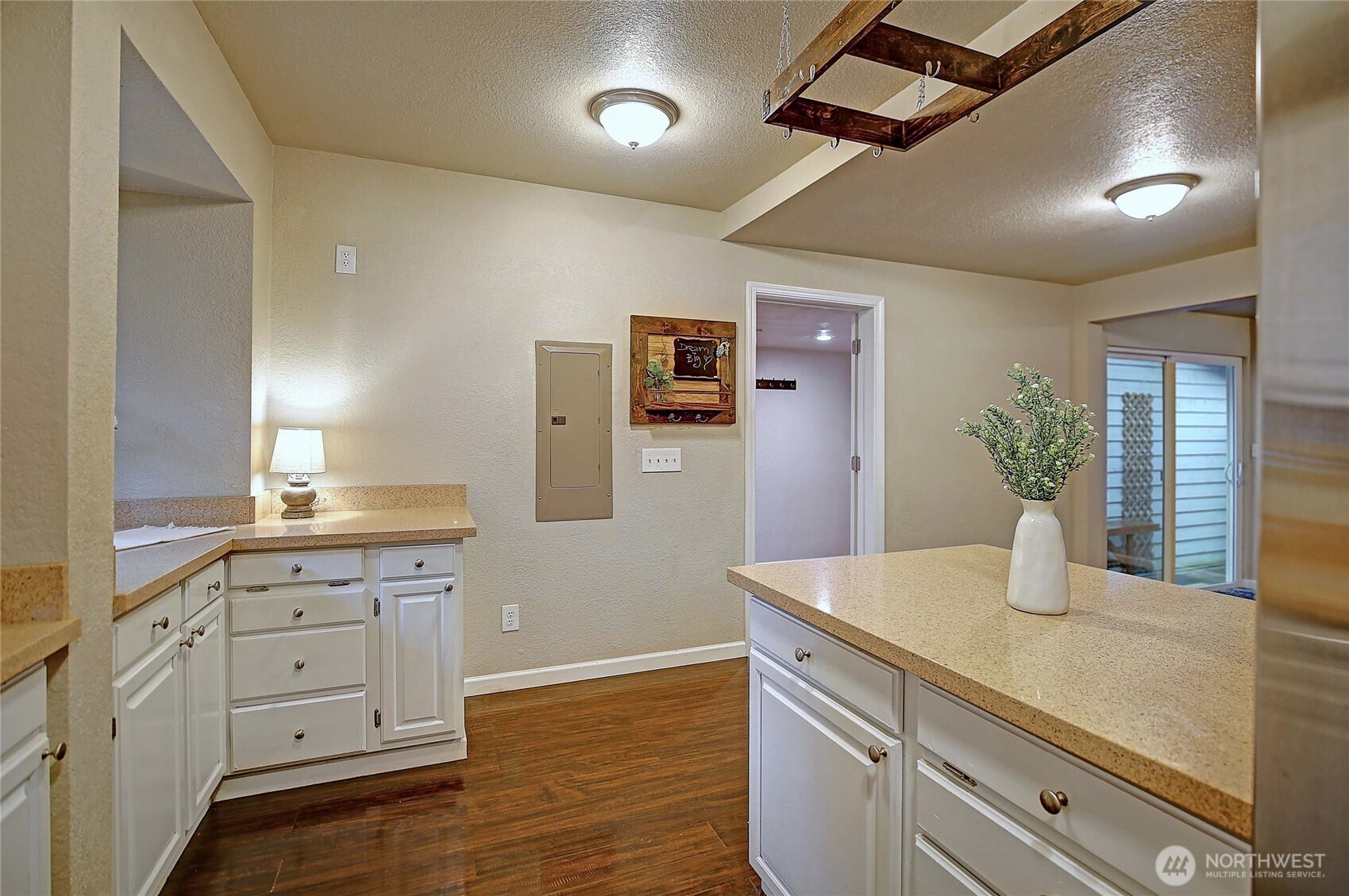 208 West Galena Street Granite Falls, WA 98252 - Photo 10 of 40 a kitchen with white cabinets and sink