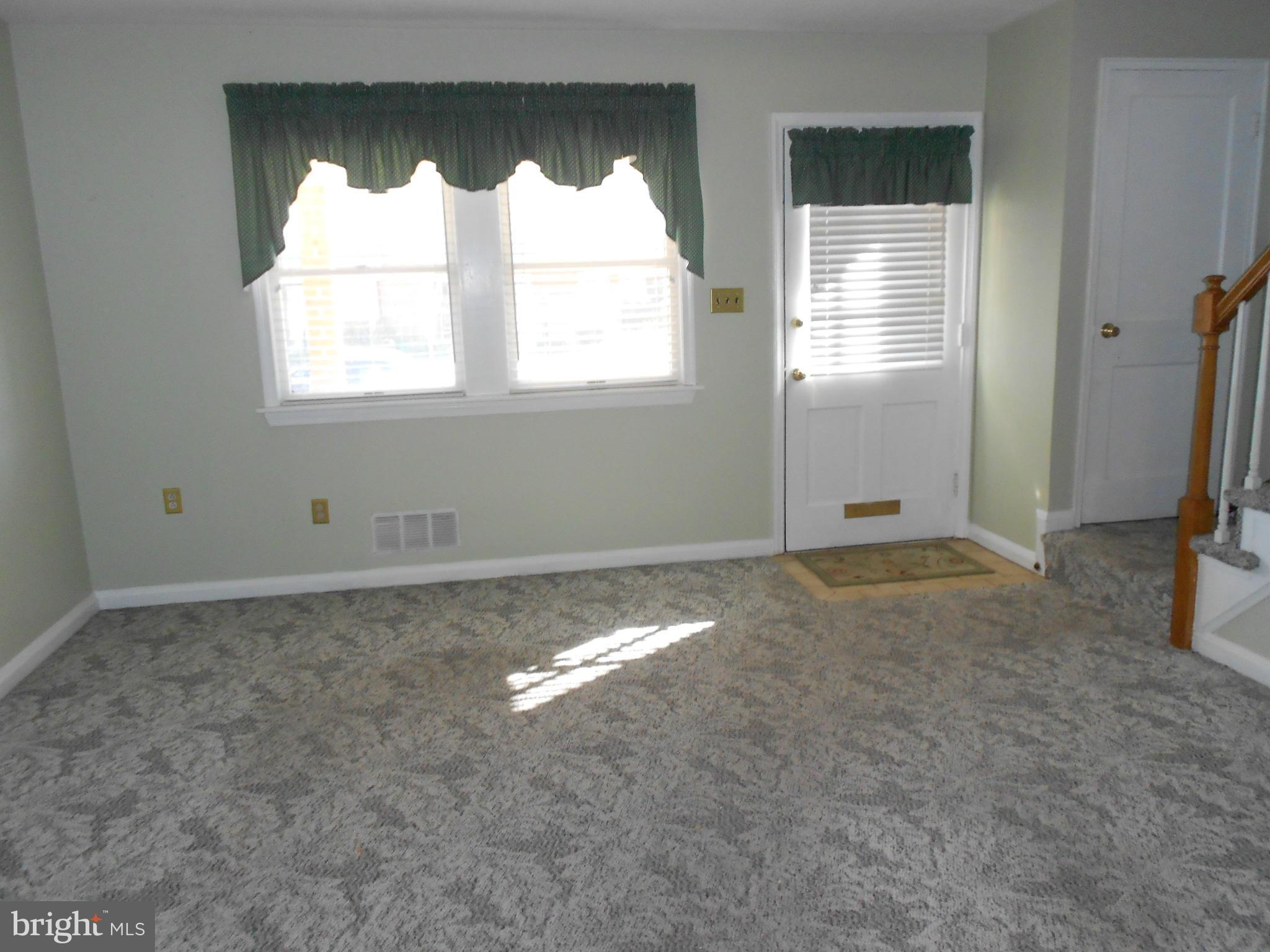 1920 Wareham Road Baltimore, MD 21222 - Photo 3 of 28 a view of a window in an empty room