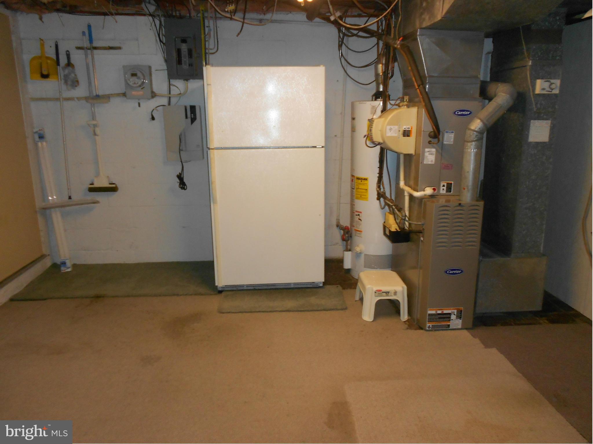 1920 Wareham Road Baltimore, MD 21222 - Photo 22 of 28 a view of a storage & utility room with washer and dryer