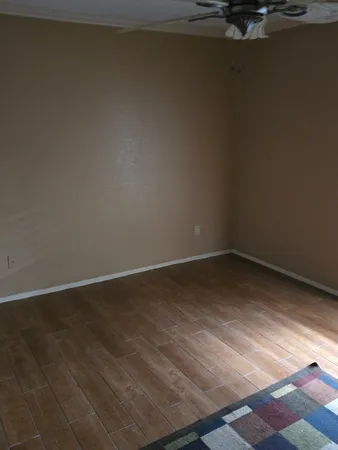 a view of a closet area with cabinets