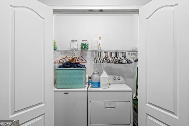 a room with a fan and a window