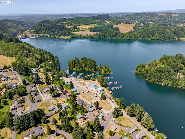 an aerial view of lake residential house with outdoor space