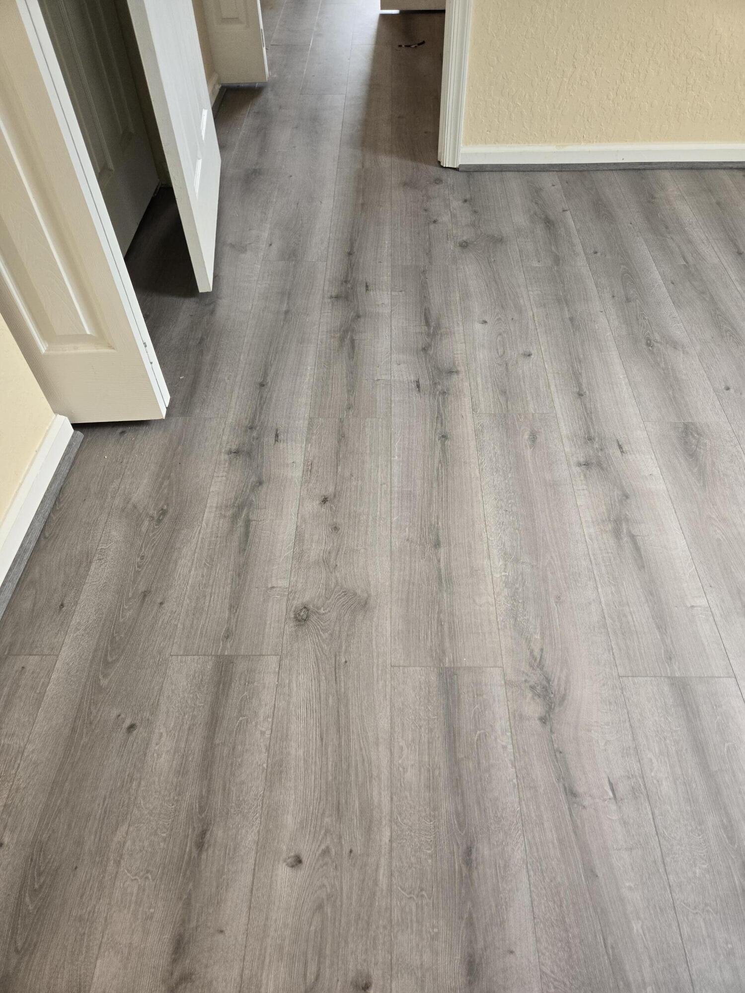 3141 Laurel Ridge Circle Riviera Beach, FL 33404 - Photo 16 of 16 a view of a hardwood floor and staircase