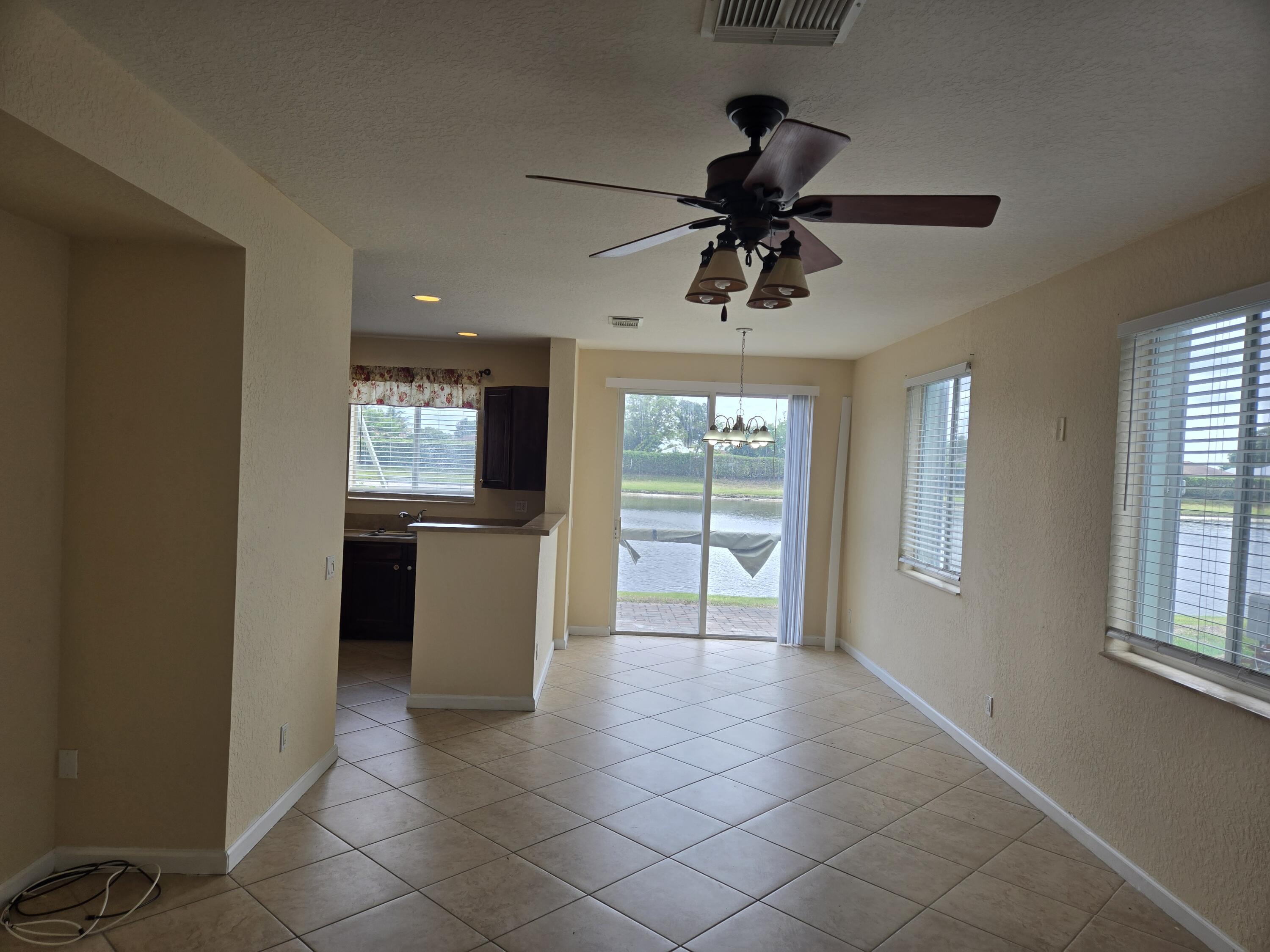 3141 Laurel Ridge Circle Riviera Beach, FL 33404 - Photo 2 of 16 a view of an empty room with a window