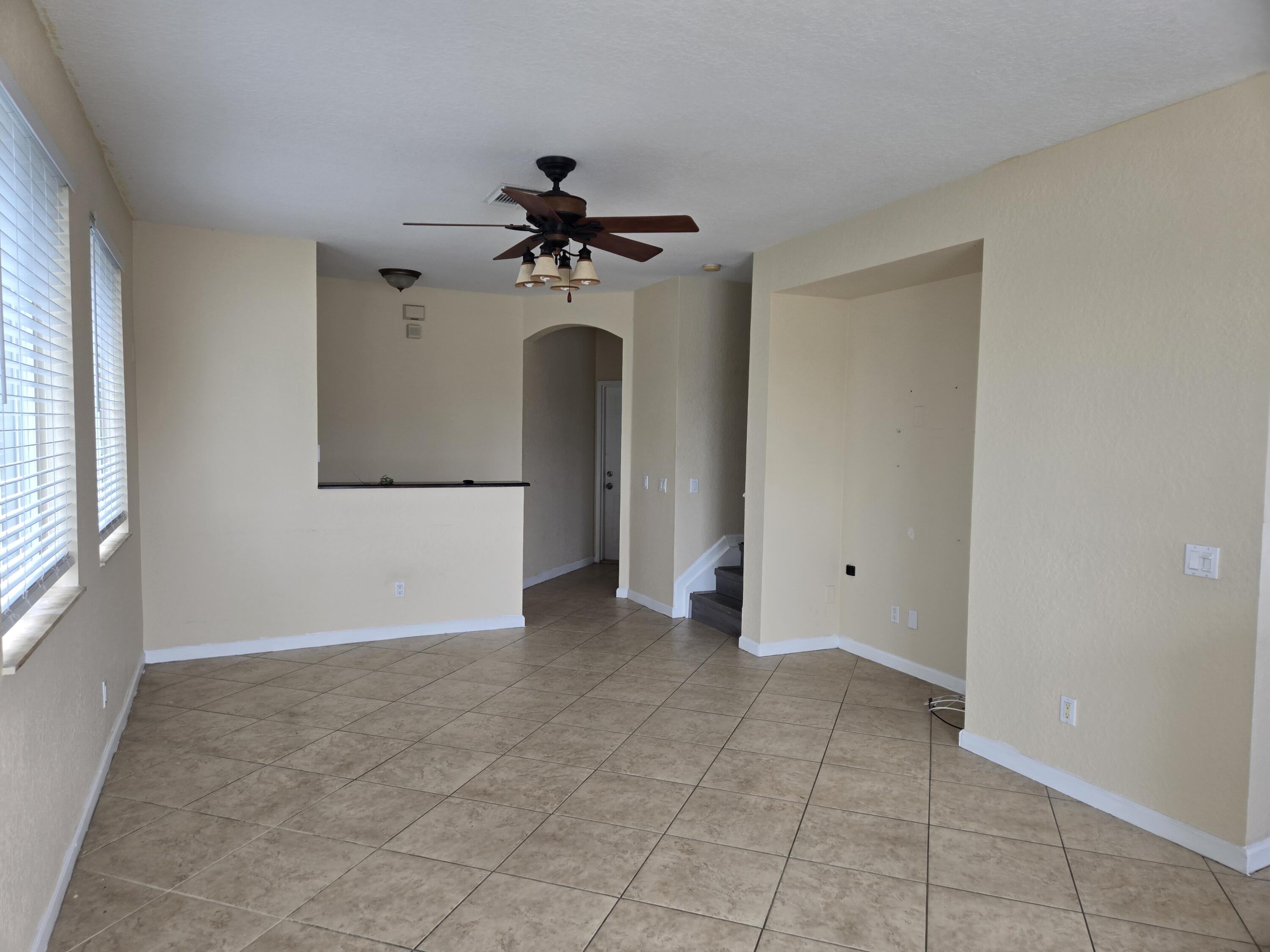 3141 Laurel Ridge Circle Riviera Beach, FL 33404 - Photo 4 of 16 a view of an empty room with a window