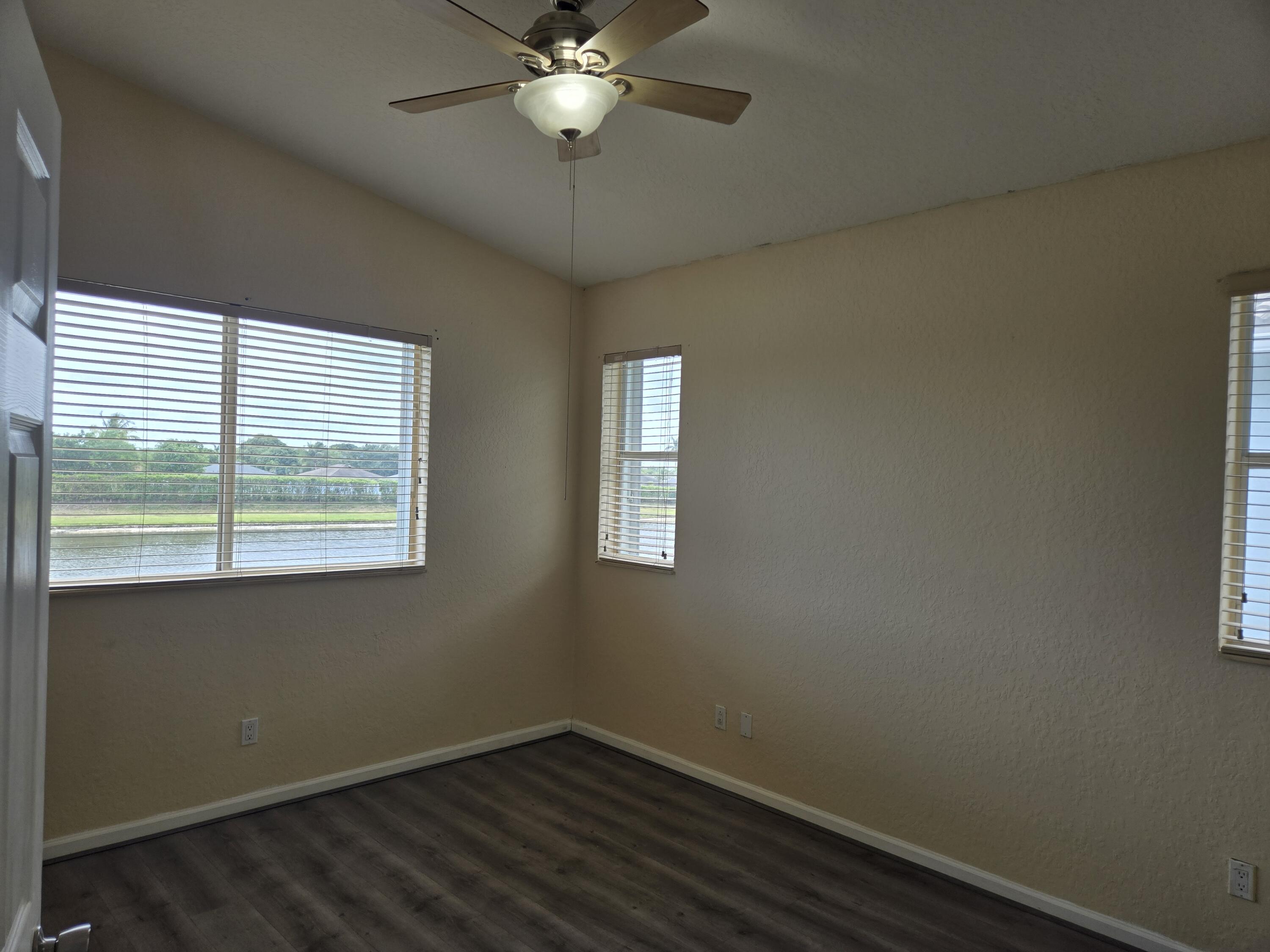 3141 Laurel Ridge Circle Riviera Beach, FL 33404 - Photo 6 of 16 a view of an empty room with a window