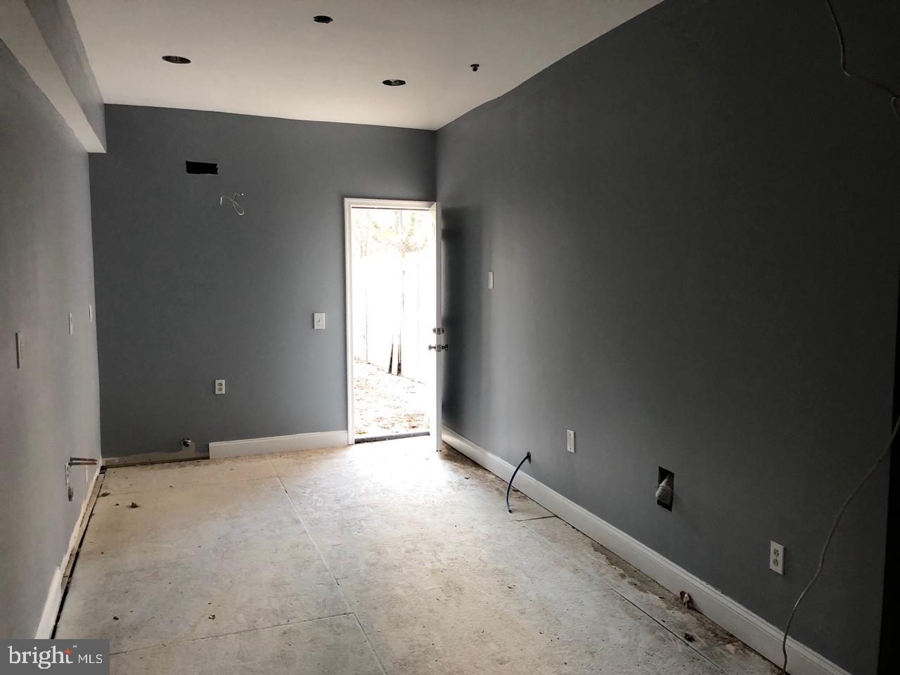 20 North Gilmor Street Baltimore, MD 21223 - Photo 3 of 19 a view of an empty room