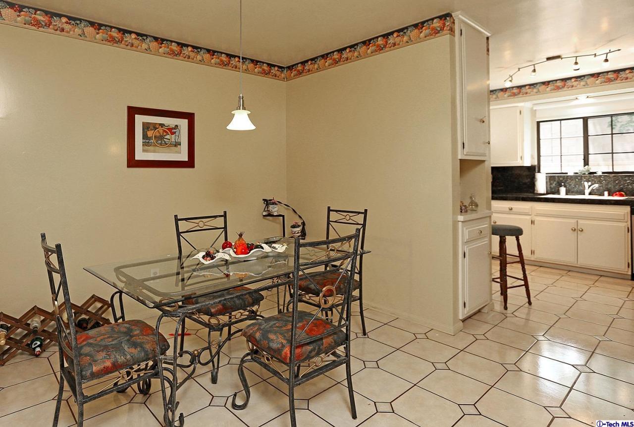1023 North Old Ranch Road Arcadia, CA 91006 - Photo 15 of 32 a view of a dining room with furniture