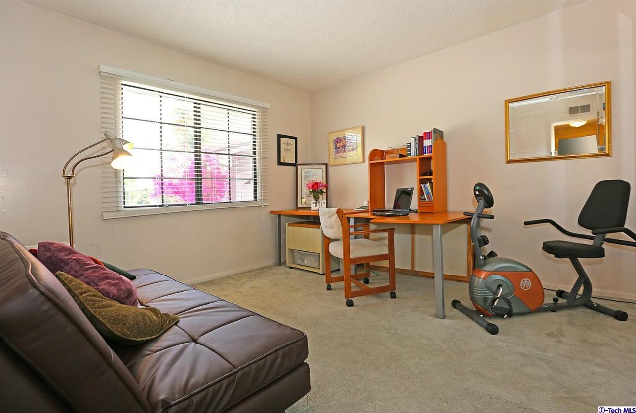 1023 North Old Ranch Road Arcadia, CA 91006 - Photo 25 of 32 a bedroom with bed and a window