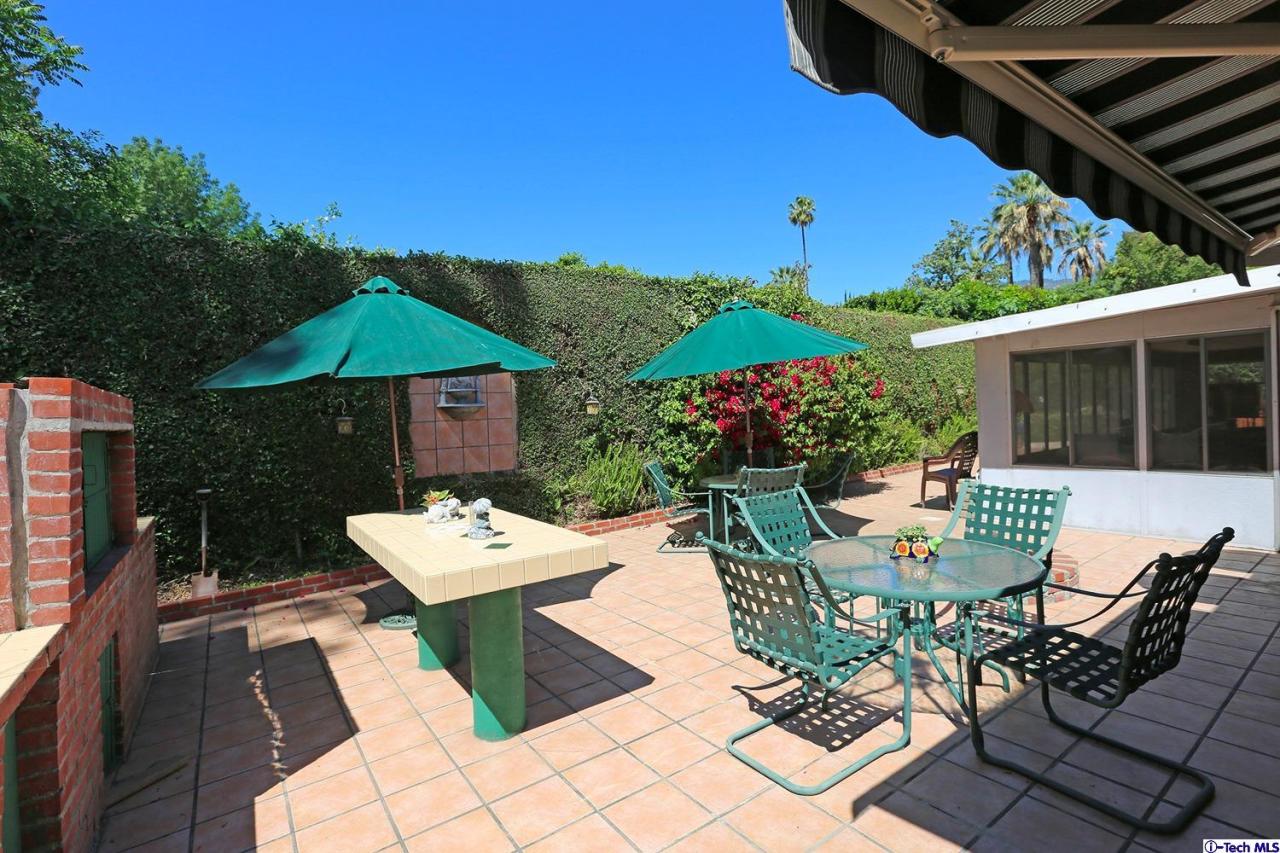 1023 North Old Ranch Road Arcadia, CA 91006 - Photo 30 of 32 a view of a patio with furniture and a backyard