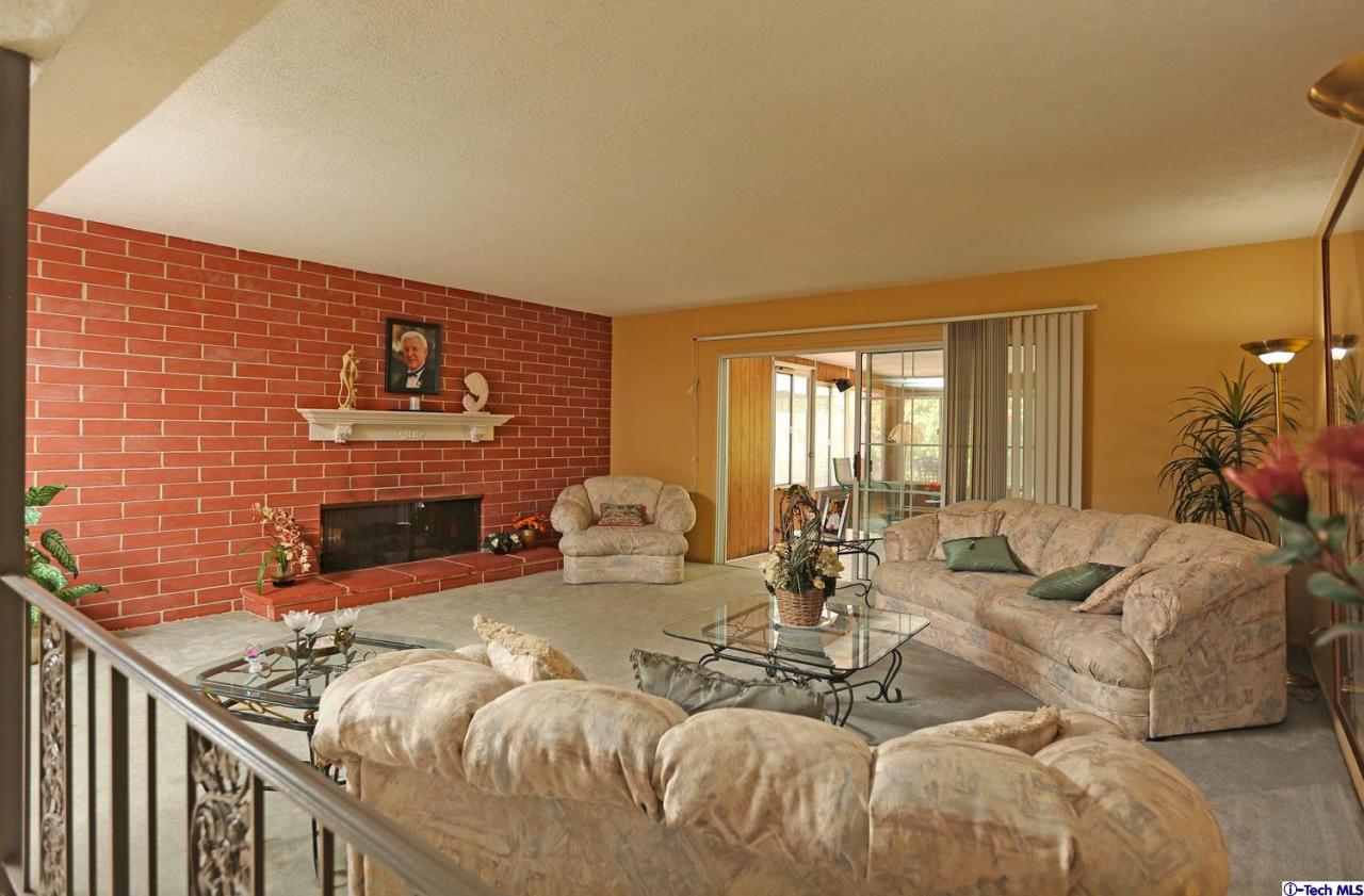 1023 North Old Ranch Road Arcadia, CA 91006 - Photo 7 of 32 a living room with furniture windows and a fireplace