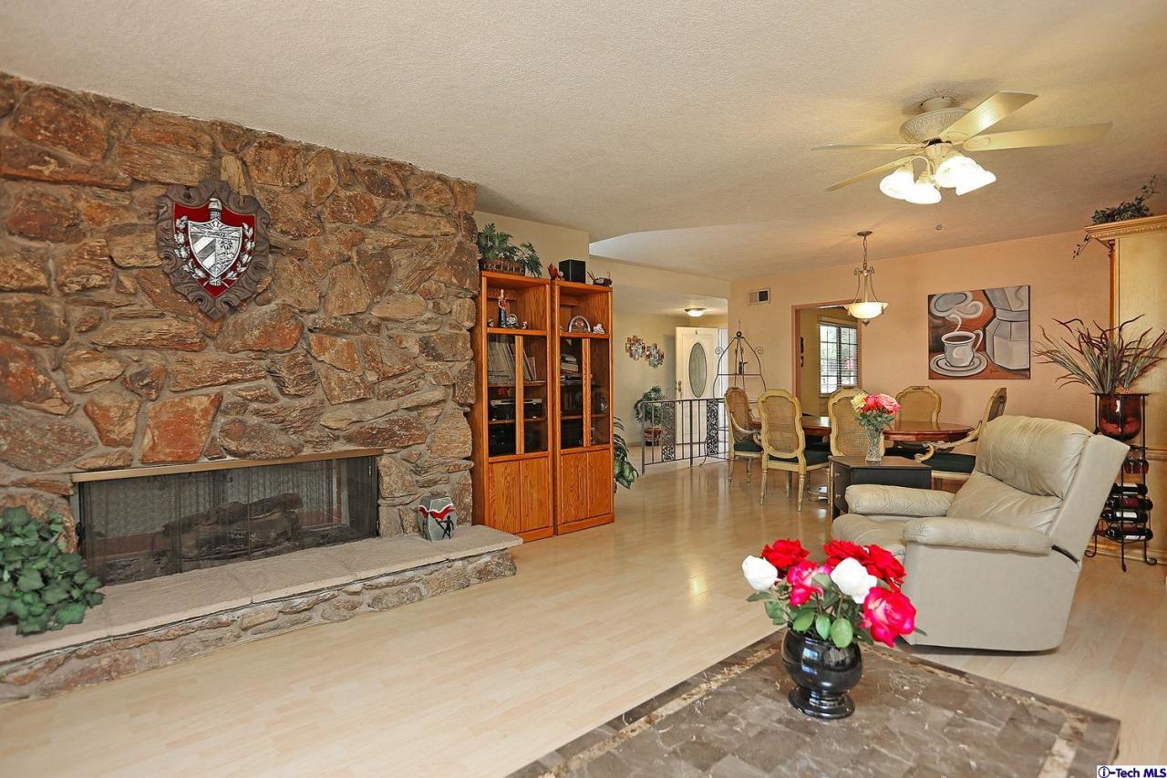 1023 North Old Ranch Road Arcadia, CA 91006 - Photo 10 of 32 a living room with furniture and flowers