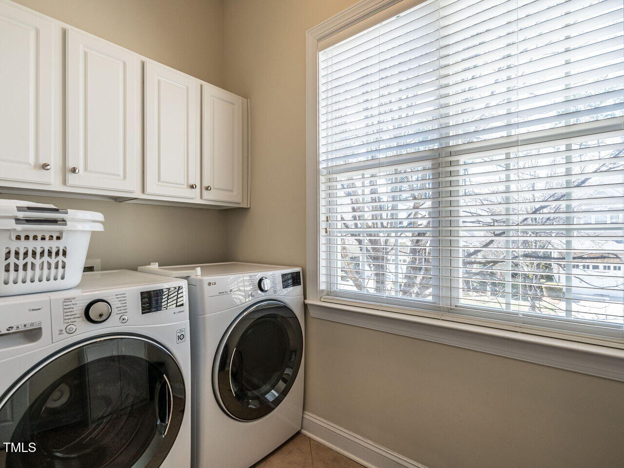 1028 Dotson Way Apex, NC 27523 - Photo 16 of 52 a view of entryway with washer and dryer