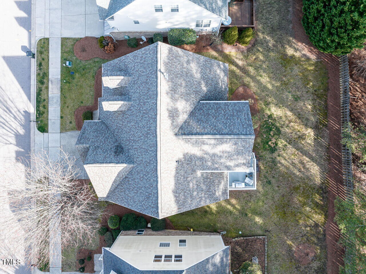 1028 Dotson Way Apex, NC 27523 - Photo 45 of 52 an aerial view of a house with a yard