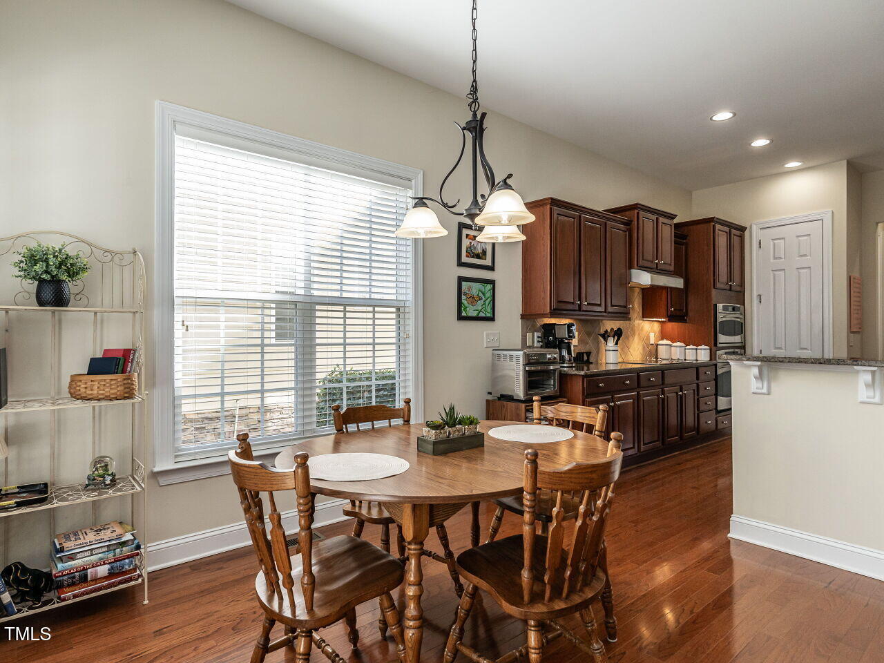 1028 Dotson Way Apex, NC 27523 - Photo 10 of 52 a view of a dining room with furniture window and outside view