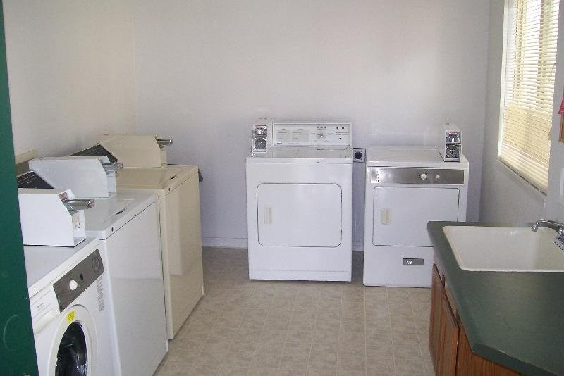 314 Spire Drive Riverton, WY 82501 - Photo 11 of 11 a utility room with dryer and washer