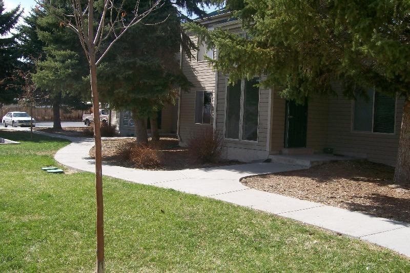 314 Spire Drive Riverton, WY 82501 - Photo 3 of 11 a backyard of a house with lots of green space