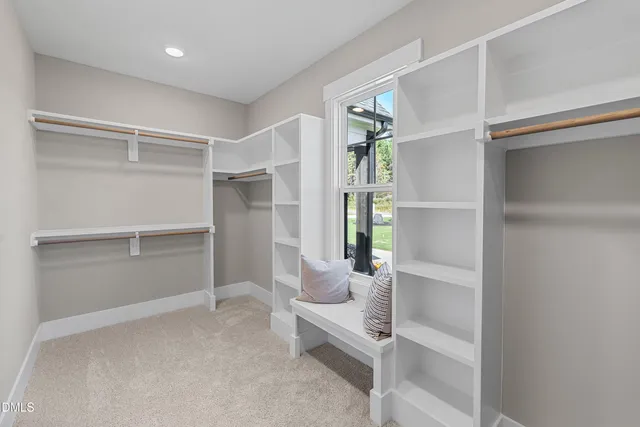 a room with a bench and furniture