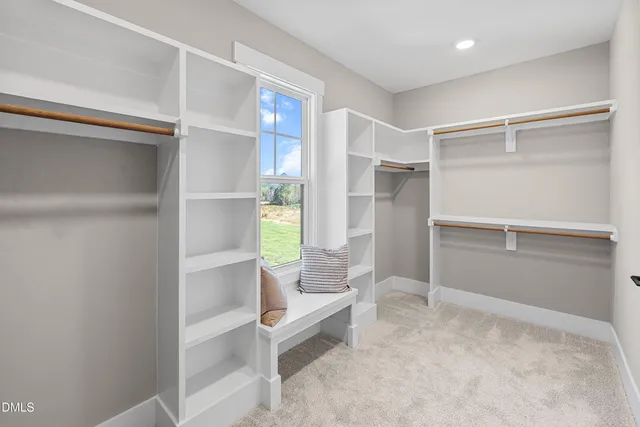 a white bath tub sitting in a bathroom