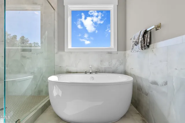 a bathroom with a sink vanity and mirror