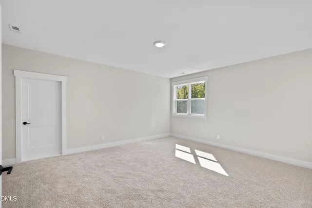 an empty room with an entryway