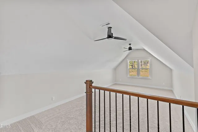 a view of empty room with windows