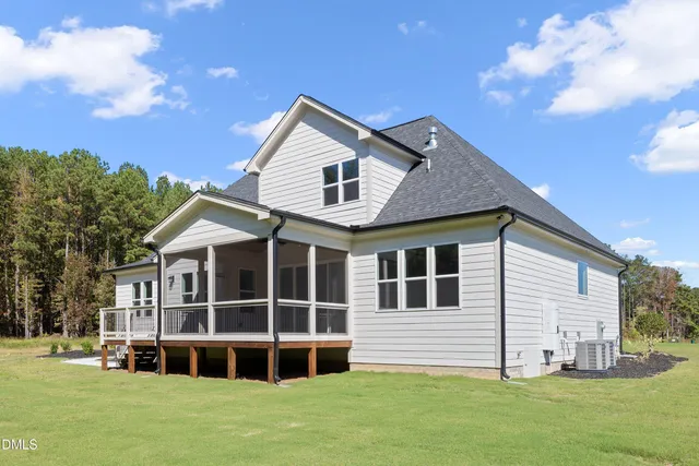 a view of a balcony with wooden floor