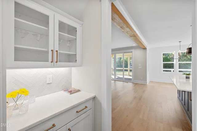 a bathroom with a sink and a window