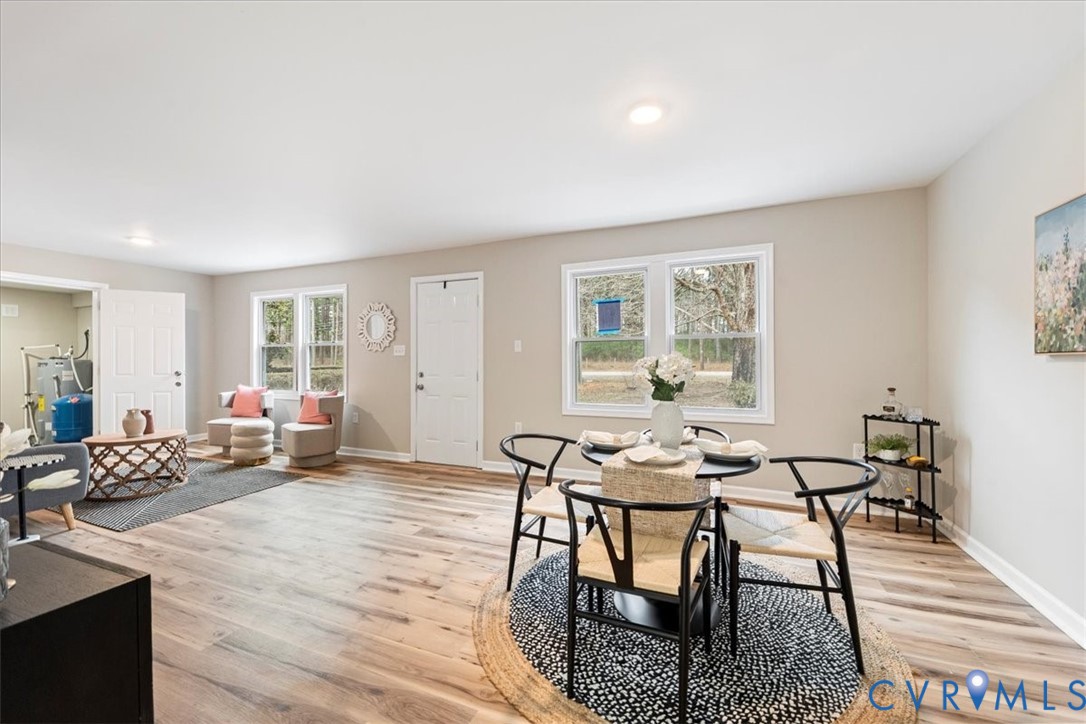 1989 Cox Road Blackstone, VA 23824 - Photo 2 of 44 Dining area featuring light wood-style floors and