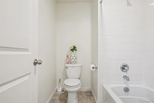 a bathroom with a sink and toilet