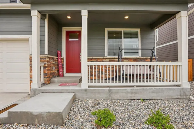a front view of a house with a porch