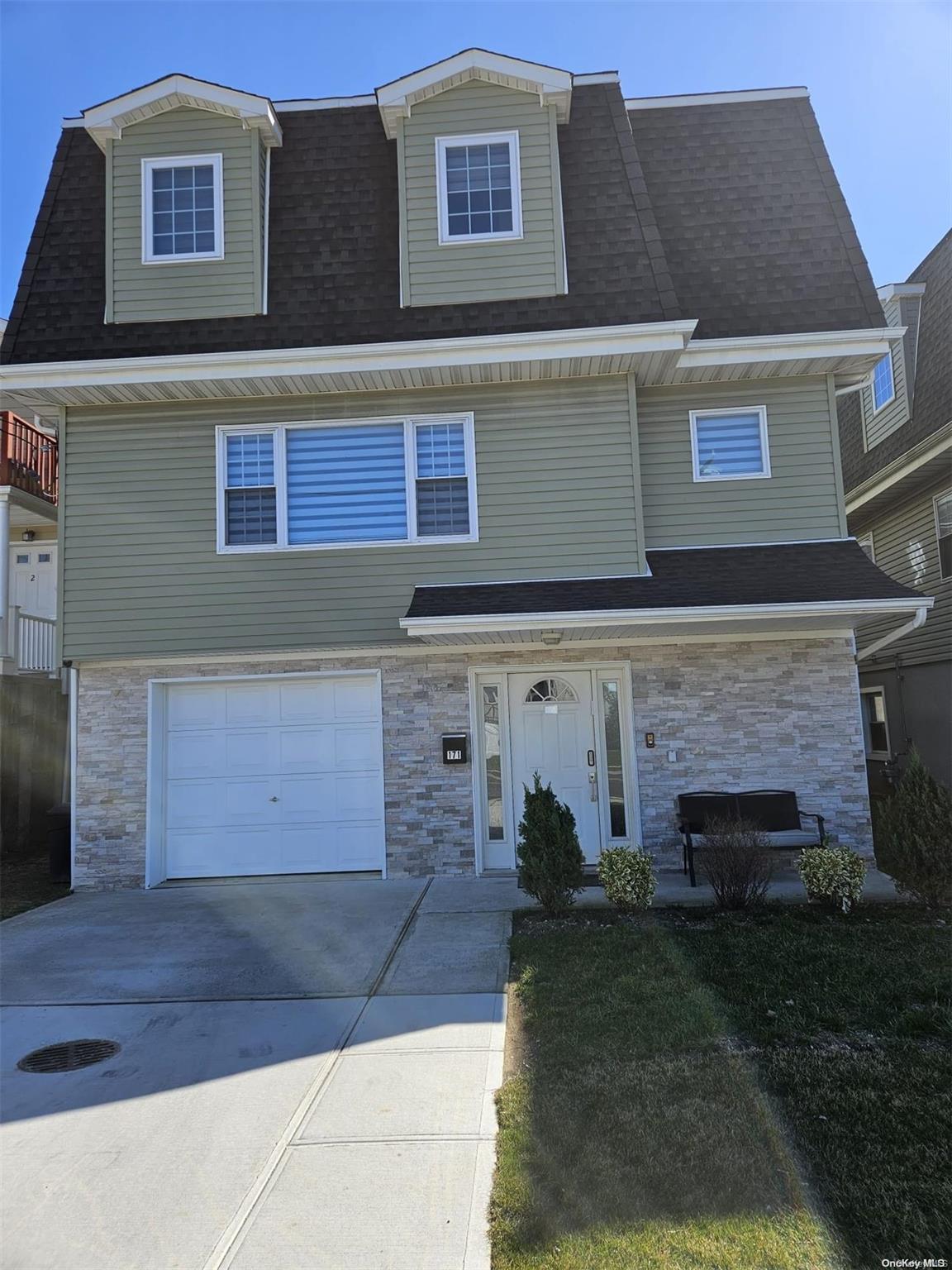 255 Elm Inwood, NY 11096 - Photo 1 of 1 a view of a brick building with many windows
