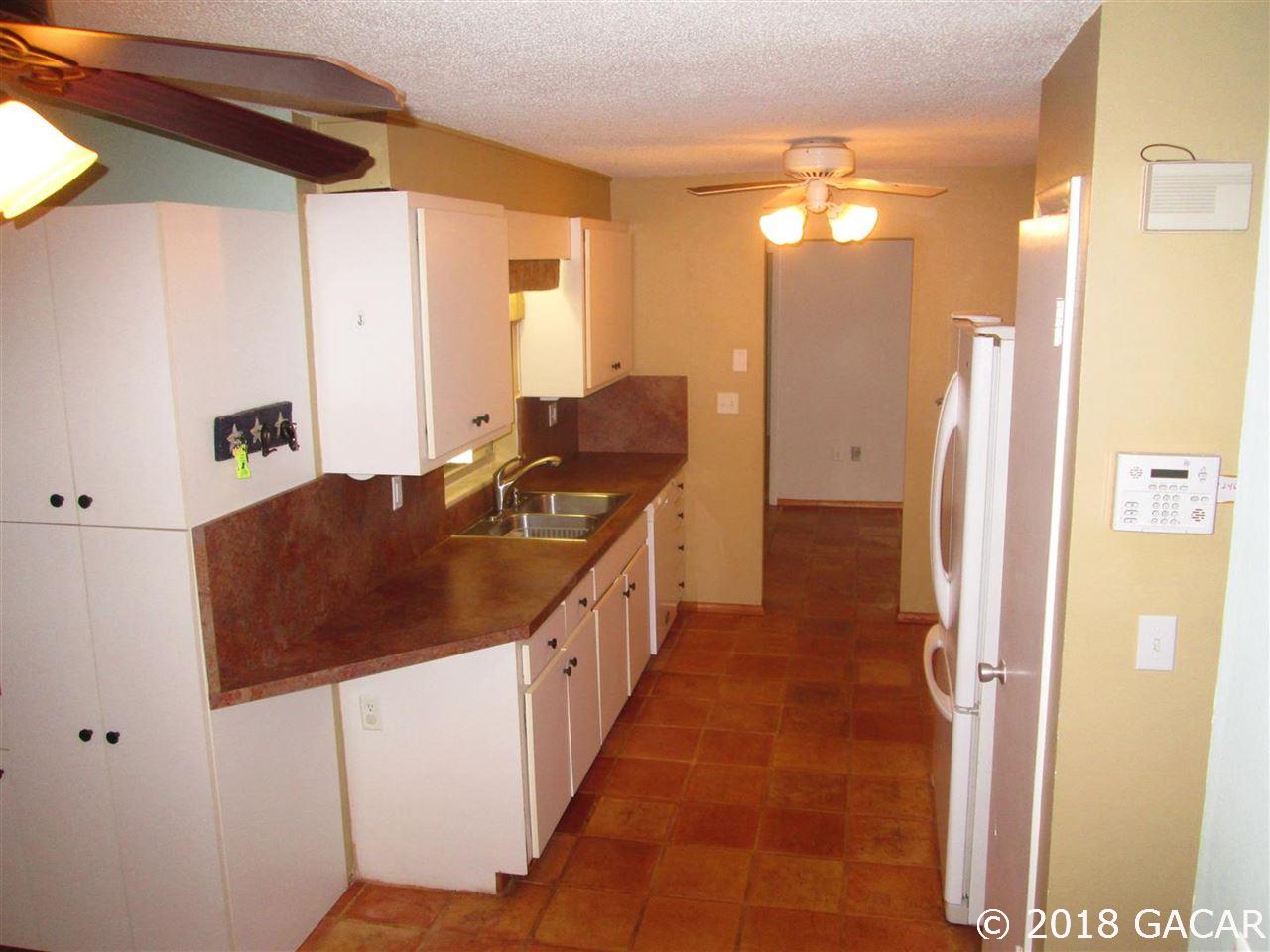 4831 Southwest 19th Way Gainesville, FL 32608 - Photo 4 of 30 Galley Kitchen