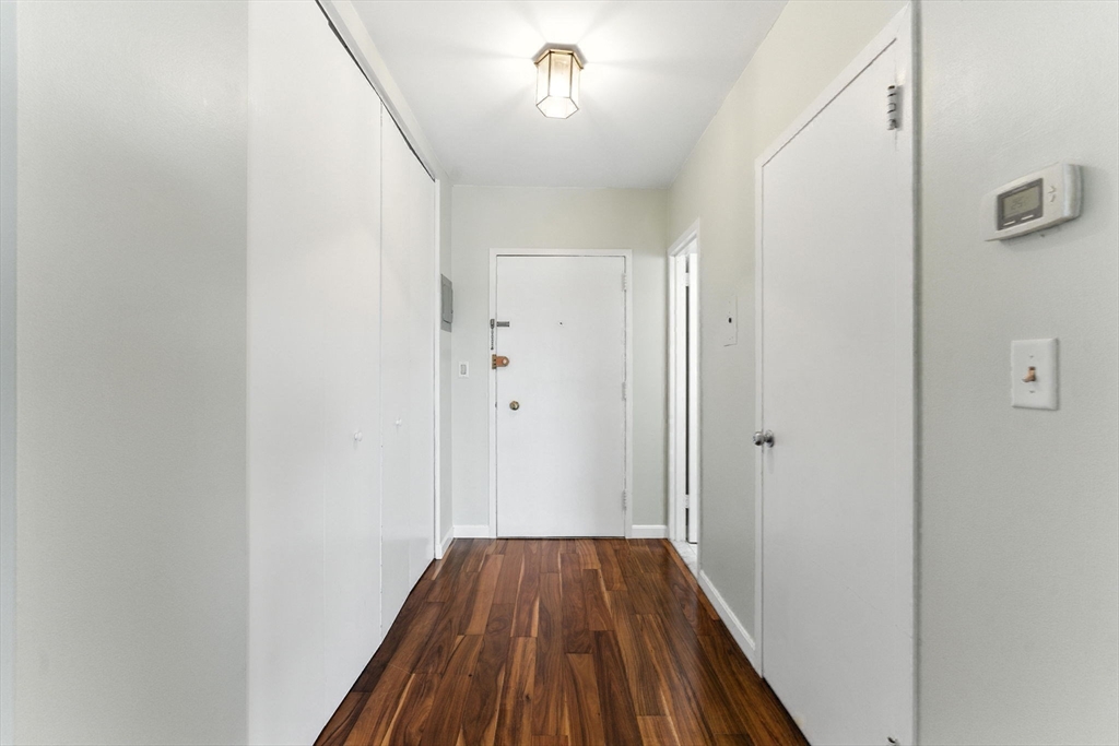 22 Chestnut Place, Unit 608 Brookline, MA 02445 - Photo 17 of 29 a view of a hallway
