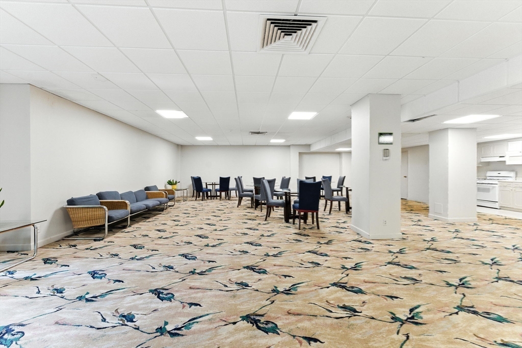 22 Chestnut Place, Unit 608 Brookline, MA 02445 - Photo 24 of 29 a view of a room with gym equipment