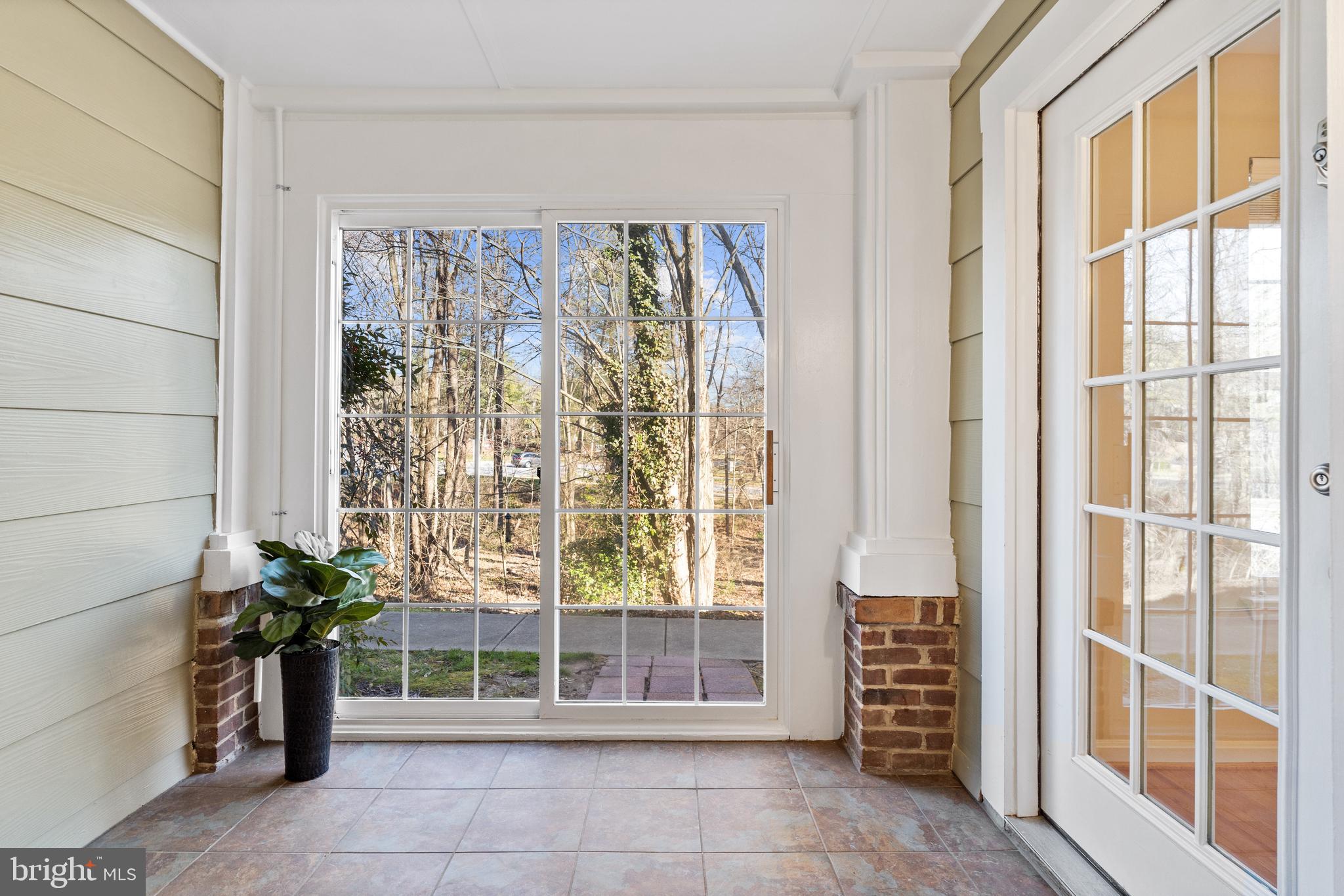 112 Kendrick Place, Unit 14 Gaithersburg, MD 20878 - Photo 12 of 37 Rare enclosed porch overlooking the trees. Nice!