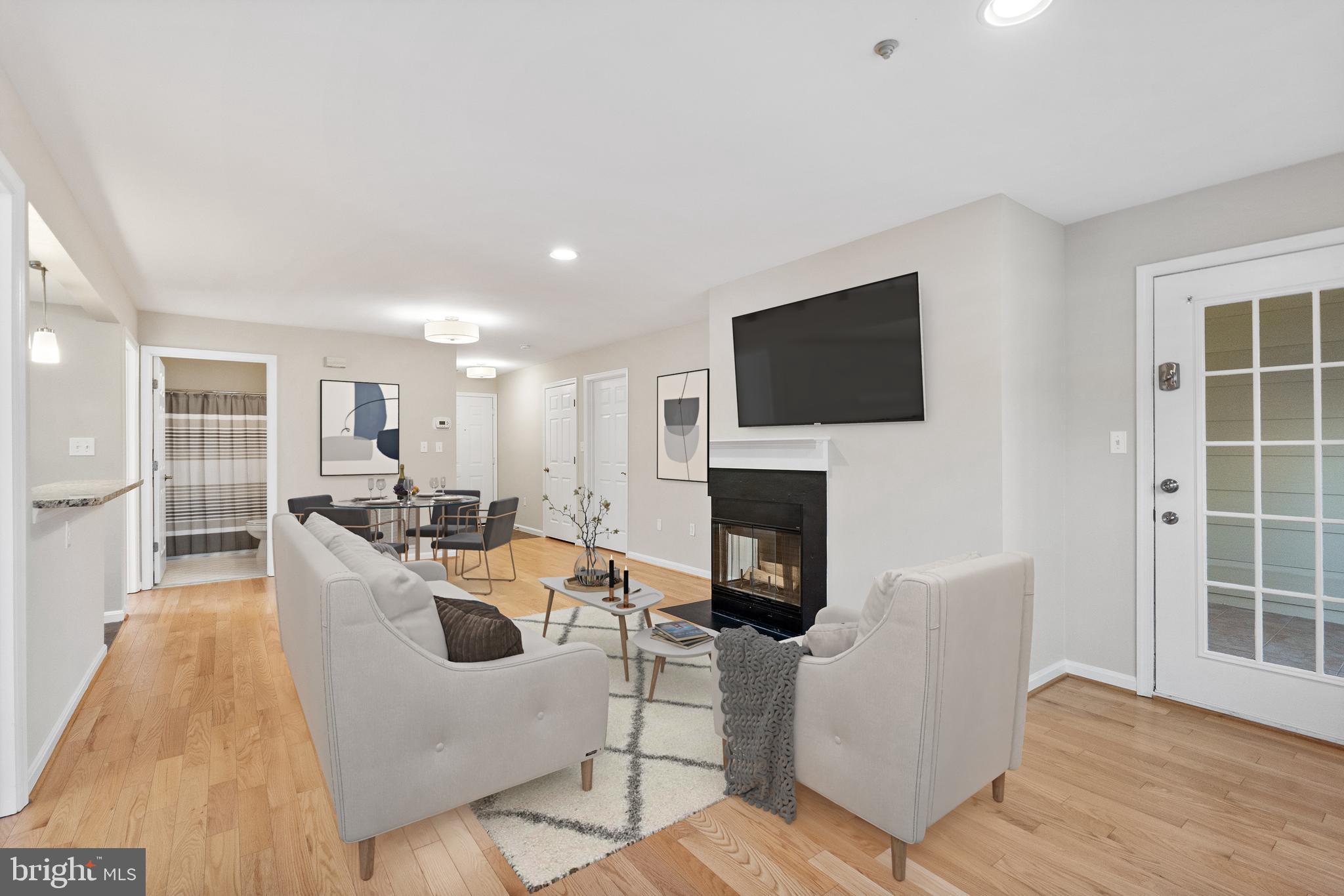 112 Kendrick Place, Unit 14 Gaithersburg, MD 20878 - Photo 5 of 37 Gleaming wood floors, fireplace & exit to porch
