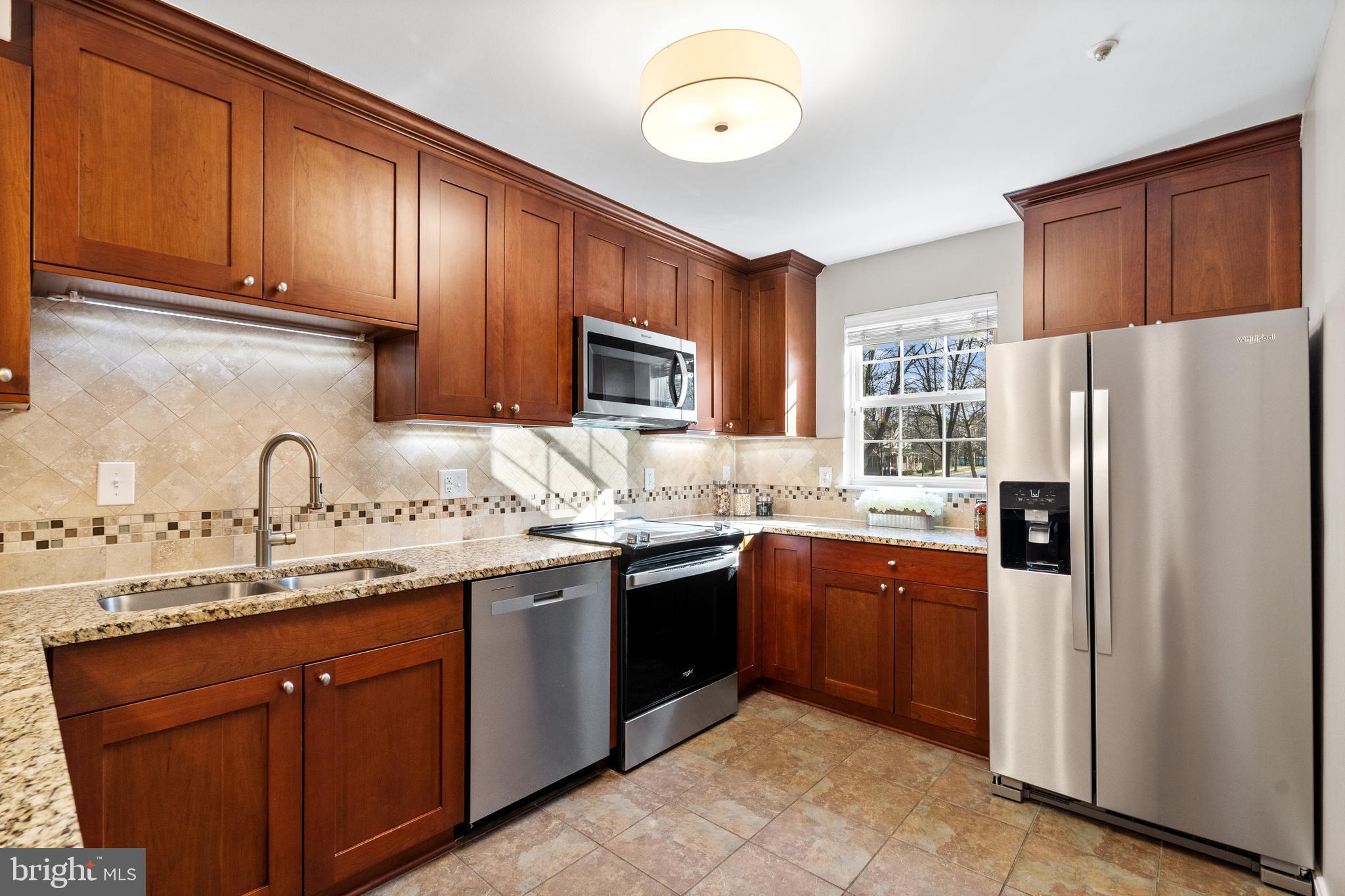 112 Kendrick Place, Unit 14 Gaithersburg, MD 20878 - Photo 9 of 37 Nearly all new S.S. appliances. 1 yr. old DW.