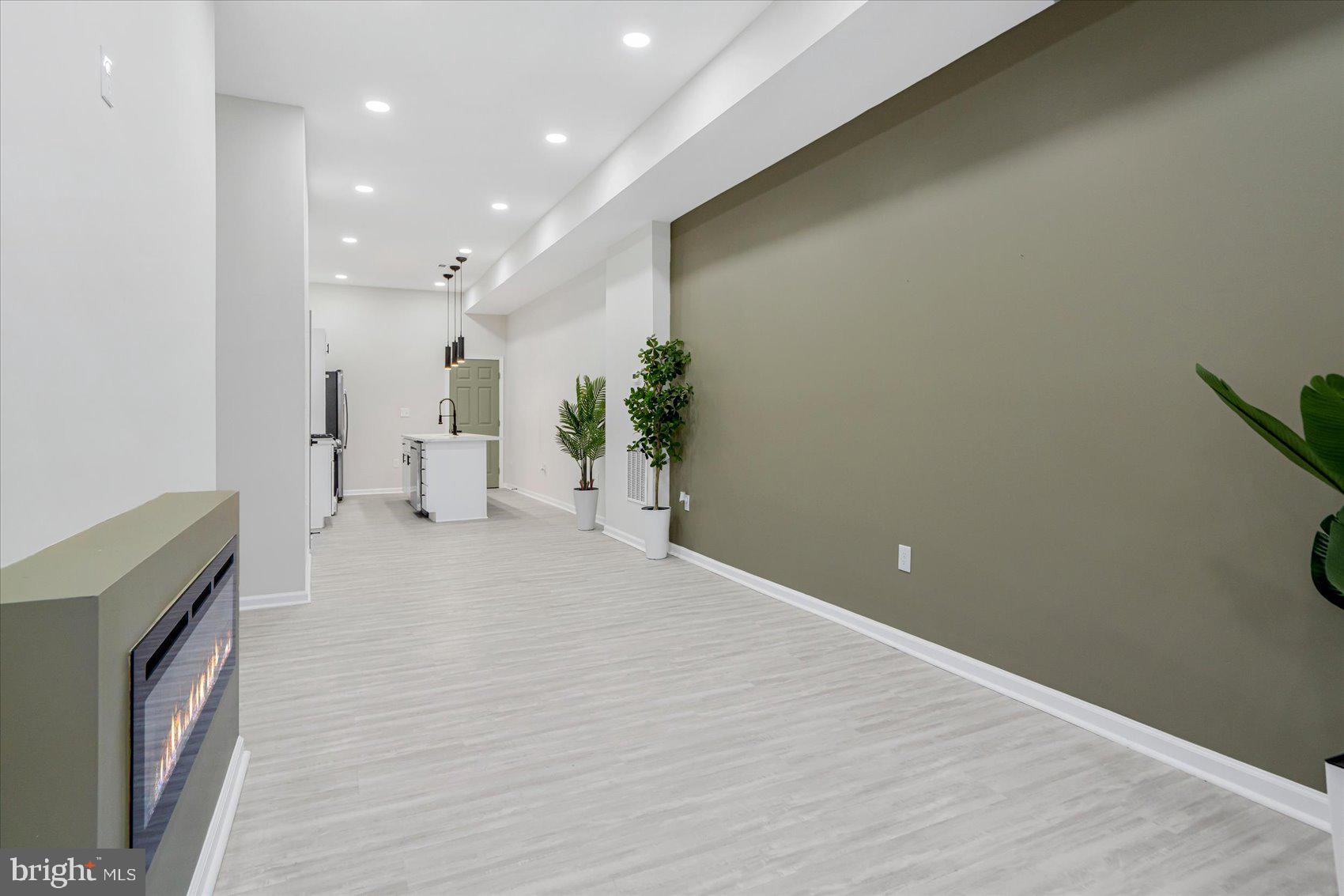 1743 Federal Street Baltimore, MD 21213 - Photo 28 of 47 a view of a livingroom with a staircase