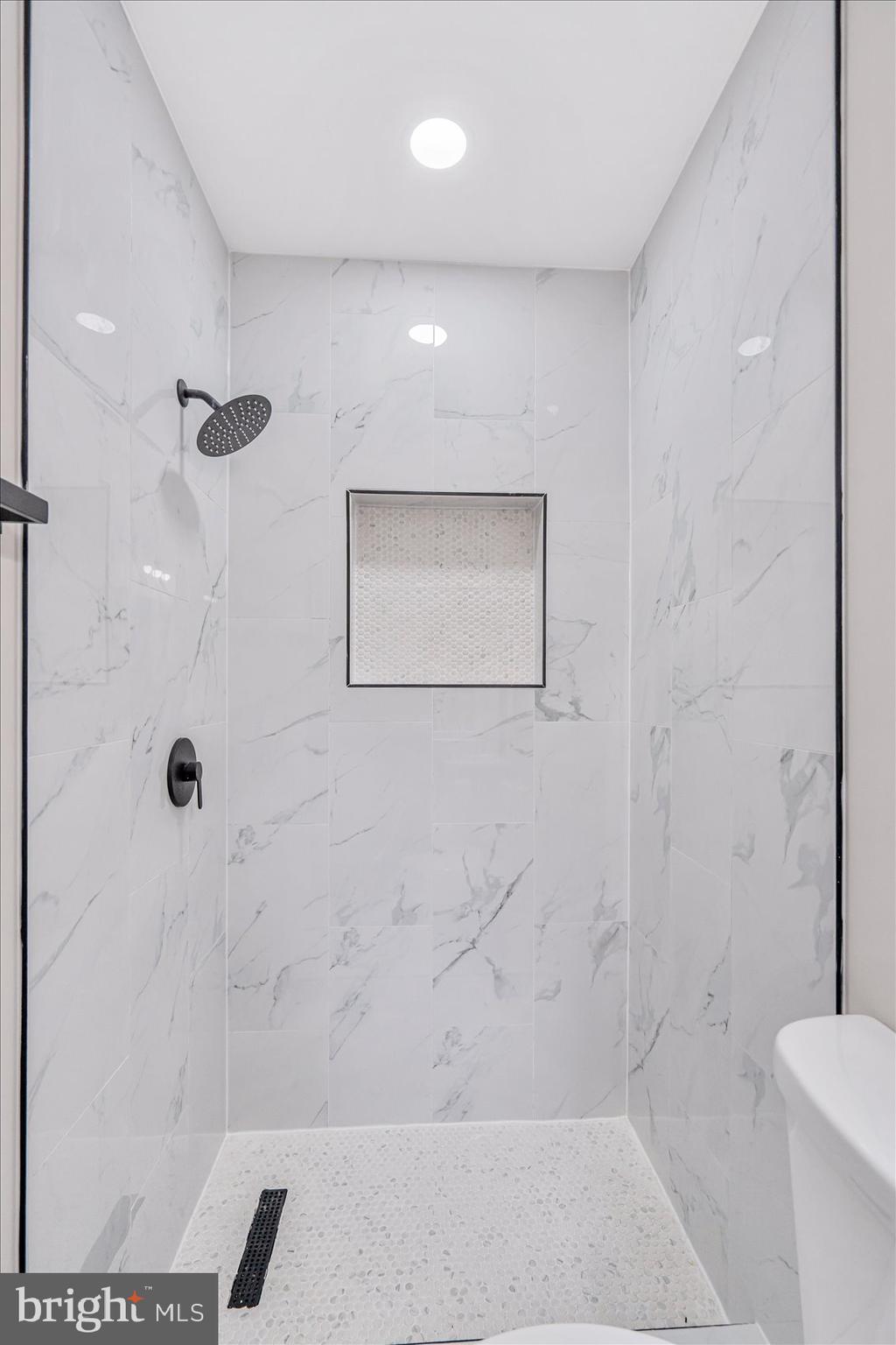 1743 Federal Street Baltimore, MD 21213 - Photo 29 of 47 a bathroom with a shower